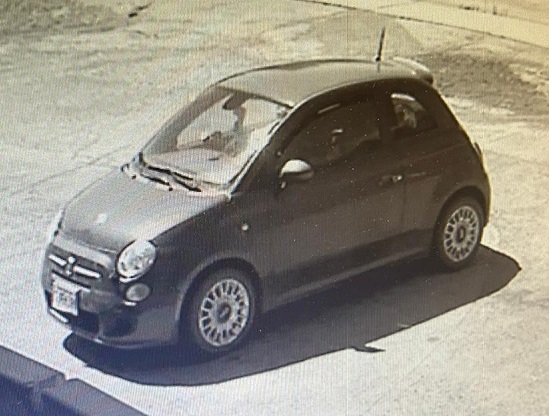 Video surveillance of suspect's vehicle, a 2-door Fiat.