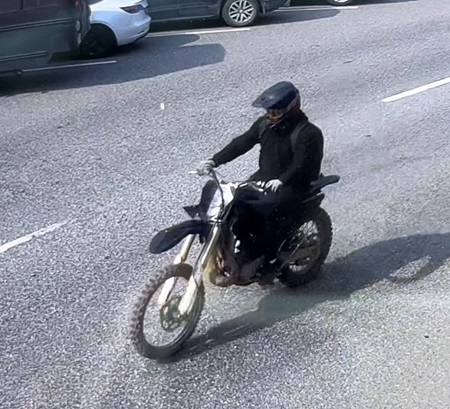 Photo of offender riding dark-coloured dirtbike