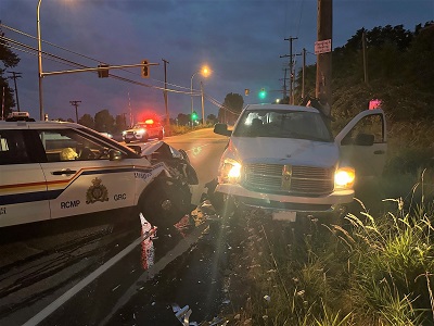 Photo of crashed truck and police car