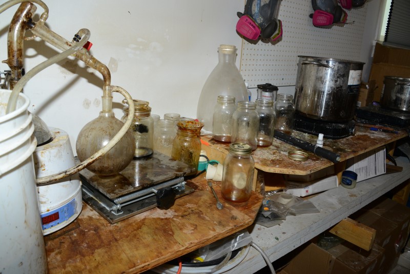 Contaminated glassware and equipment located within the synthetic drug lab