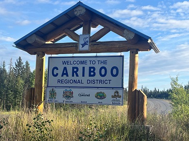 Highway sign that says ‘Welcome to the Cariboo Regional District’