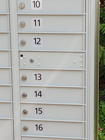 Photo of mailbox with hole drilled in it