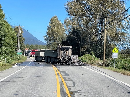 Photo of collision scene with dump truck