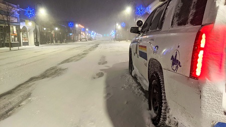 Photo of RCMP vehicle on a snowy street