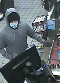 male suspect involved in the robbery - grey hoodie