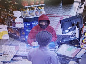 Photo of suspect with red hooded shirt