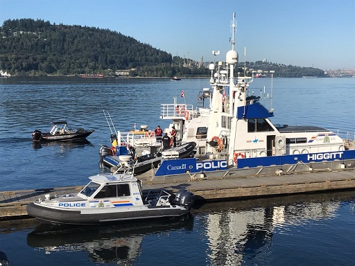 The North Vancouver RCMP police boat alongside a RCMP Marine Unit boat