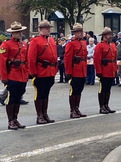 RCMP officers wearing red serge attend Remembrance day ceremony in Trail.