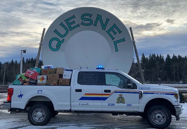 Photo of police truck loaded with donated items in front of Quesnel Goldpan