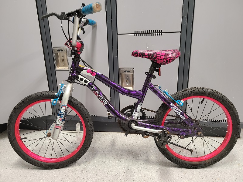 Pink and purple Monster High child’s bike