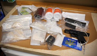 Drugs, cash and gun seized 