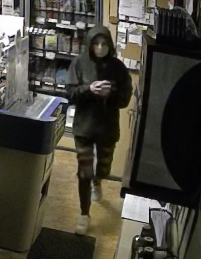 Female suspect wearing dark colour hoodie