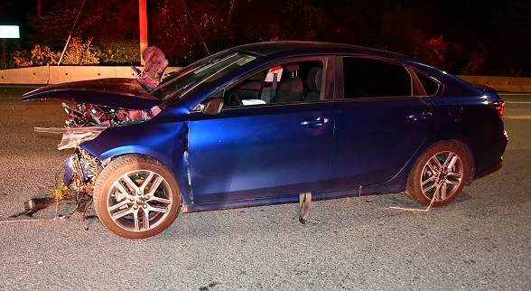 Photo of Kia Forte after it was pulled out of the ditch