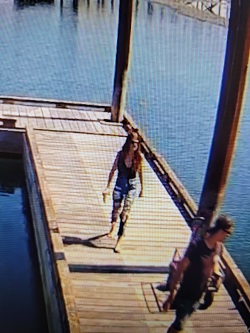 Woman and man leaving dock