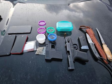 Three cellphones, small baggies and plastic containers of drugs, knives, and a black pistol were seized during an enforcement project in Kamloops.
