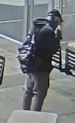 Surveillance still-image of the side profile of the suspect