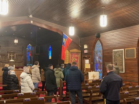 Group of several police officers attending the Chapel at the RCMP Training Academy.