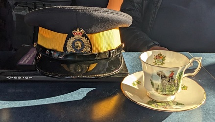 photo of RCMP hat and teacup